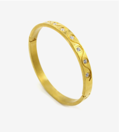 Home Gold bangle with engraved circles